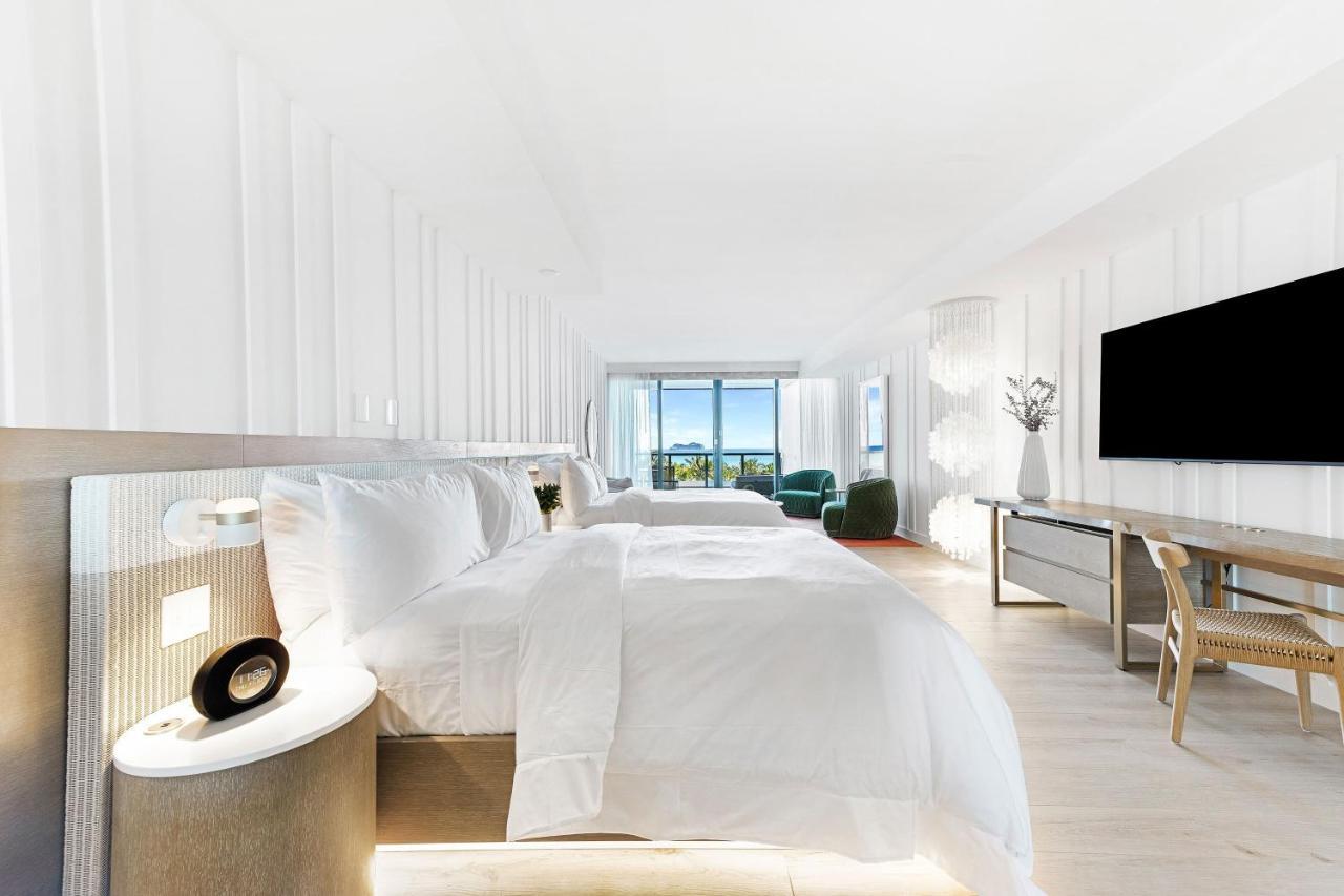 Suite Premier con 2 camas grandes y balcón frente al mar